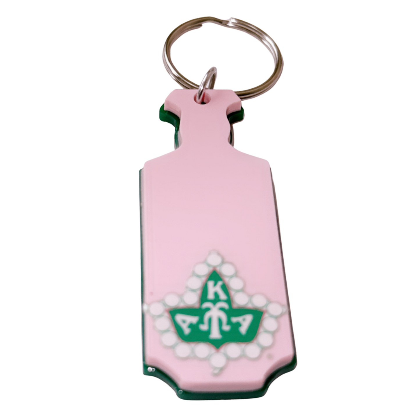 Pink keychain with green and white design on a white background. Paddle keychain for members of Alpha Kappa Alpha.