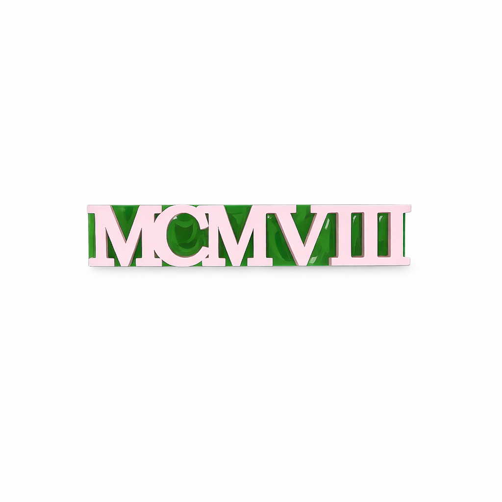 Alpha Kappa Alpha MCMVIII Roman numeral pin in pink and green displayed on a pure white background