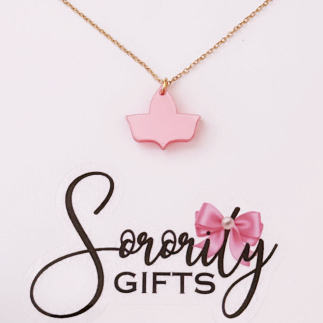 Solid pink ivy leaf pendant necklace with a gold chain, displayed on a white backing card with the "Sorority Gifts" logo featuring a pink bow.