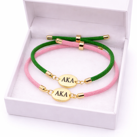 Alpha Kappa Alpha Adjustable Rope Bracelet with Engraved Stainless Steel Charm