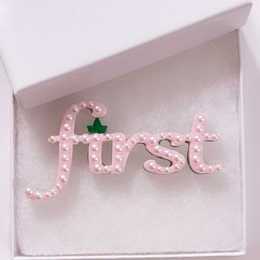 First Brooch