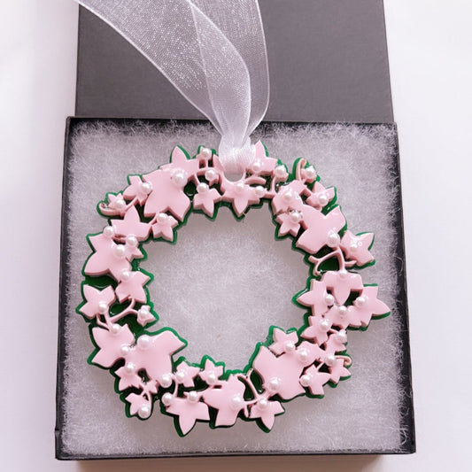 2024 Edition AKA Ivy Ornament featuring a two-layer pink and green acrylic design adorned with pearl embellishments. A perfect holiday keepsake celebrating Alpha Kappa Alpha Sorority, Inc., ideal for gift-giving or adding elegance to your decor.