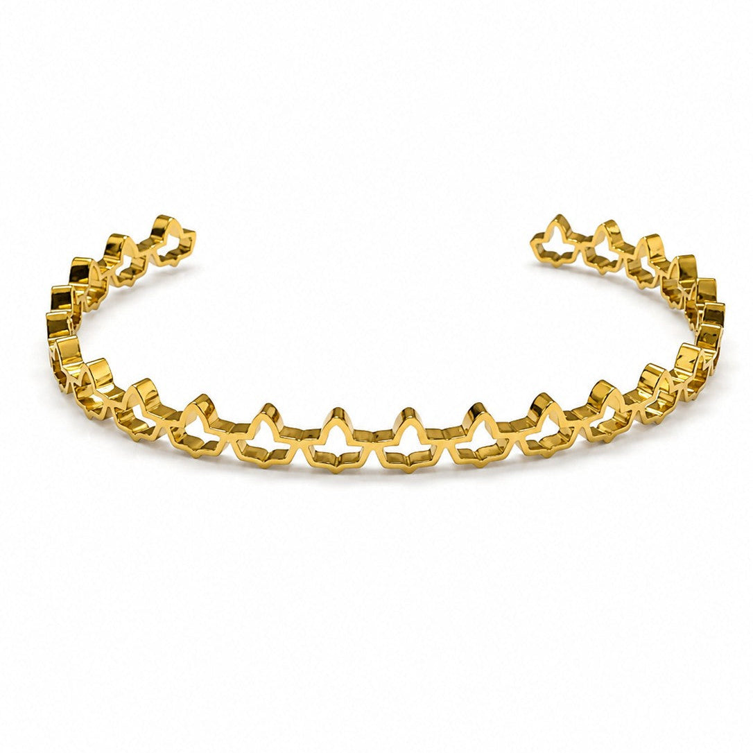 Adjustable gold stainless steel ivy cuff bracelet featuring an elegant ivy cutout design on a white background.