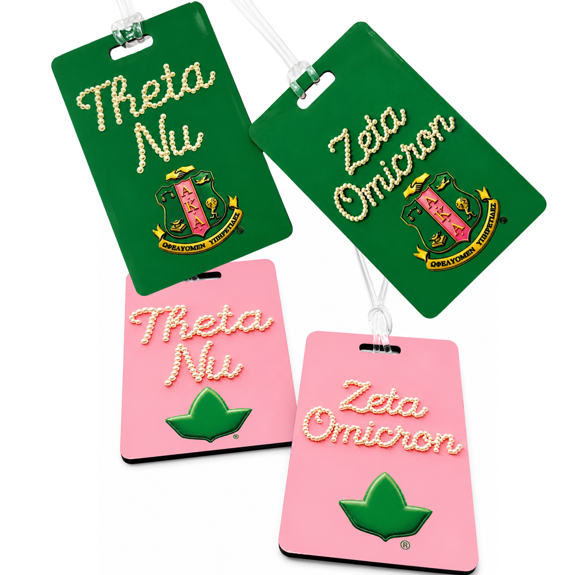 Four personalized Alpha Kappa Alpha-inspired luggage and purse tags in pink and green, featuring Theta Nu and Zeta Omicron chapter names in pearl lettering with the AKA shield or ivy emblem, displayed on a white background with clear luggage loops.