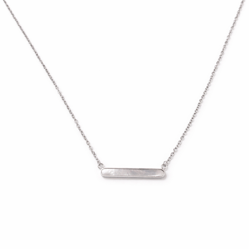 Silver pearl bar necklace worn on model with sleek horizontal bar design