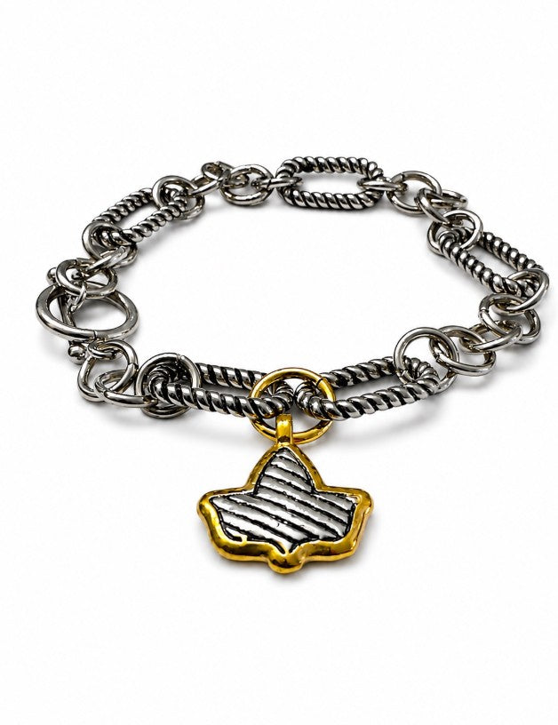 Stainless steel two tone ivy charm link bracelet featuring textured silver chain links, a gold-tone ivy charm, and a secure toggle clasp on a white background.